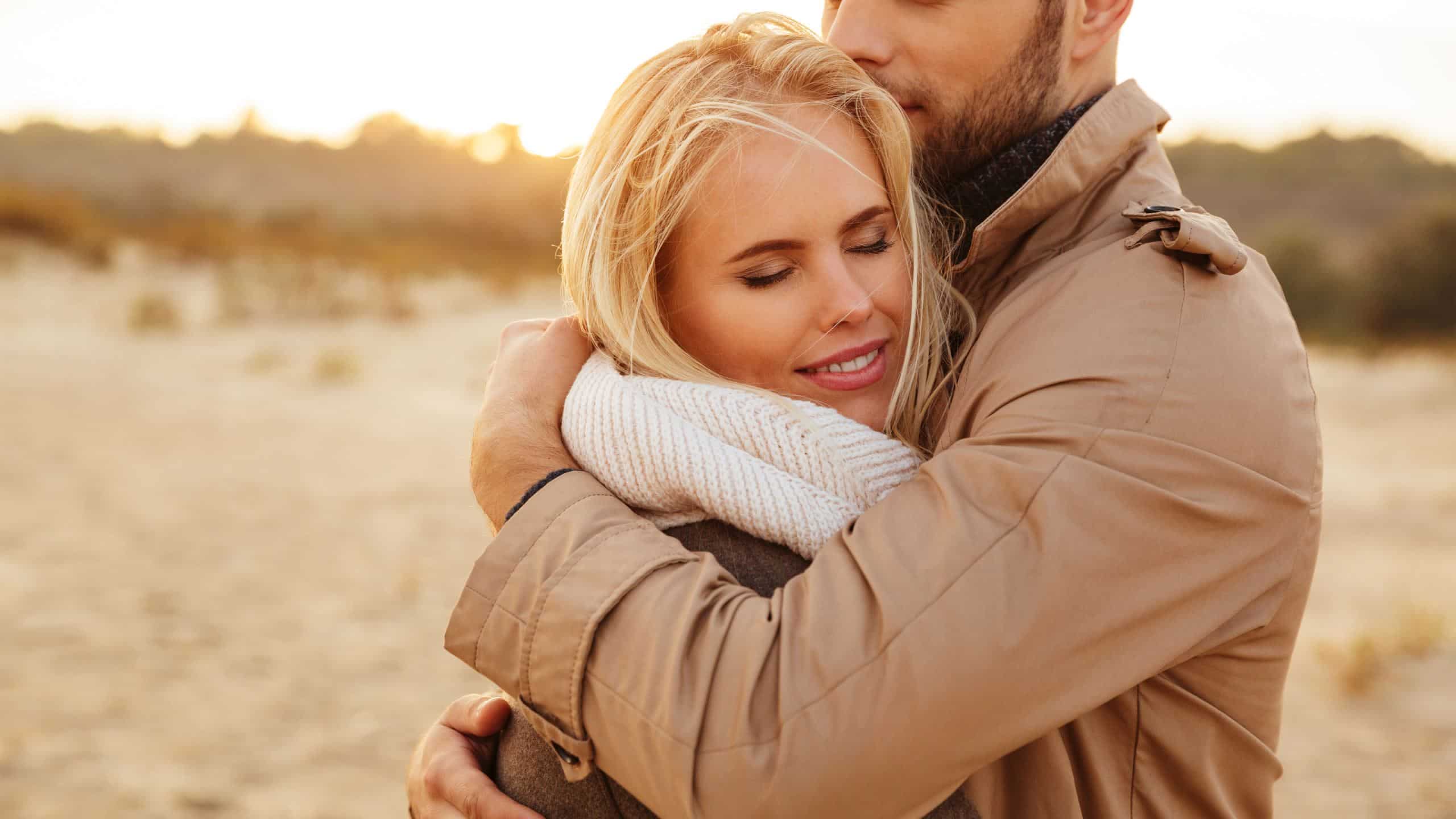 Boyfriend hugging his girlfriend.