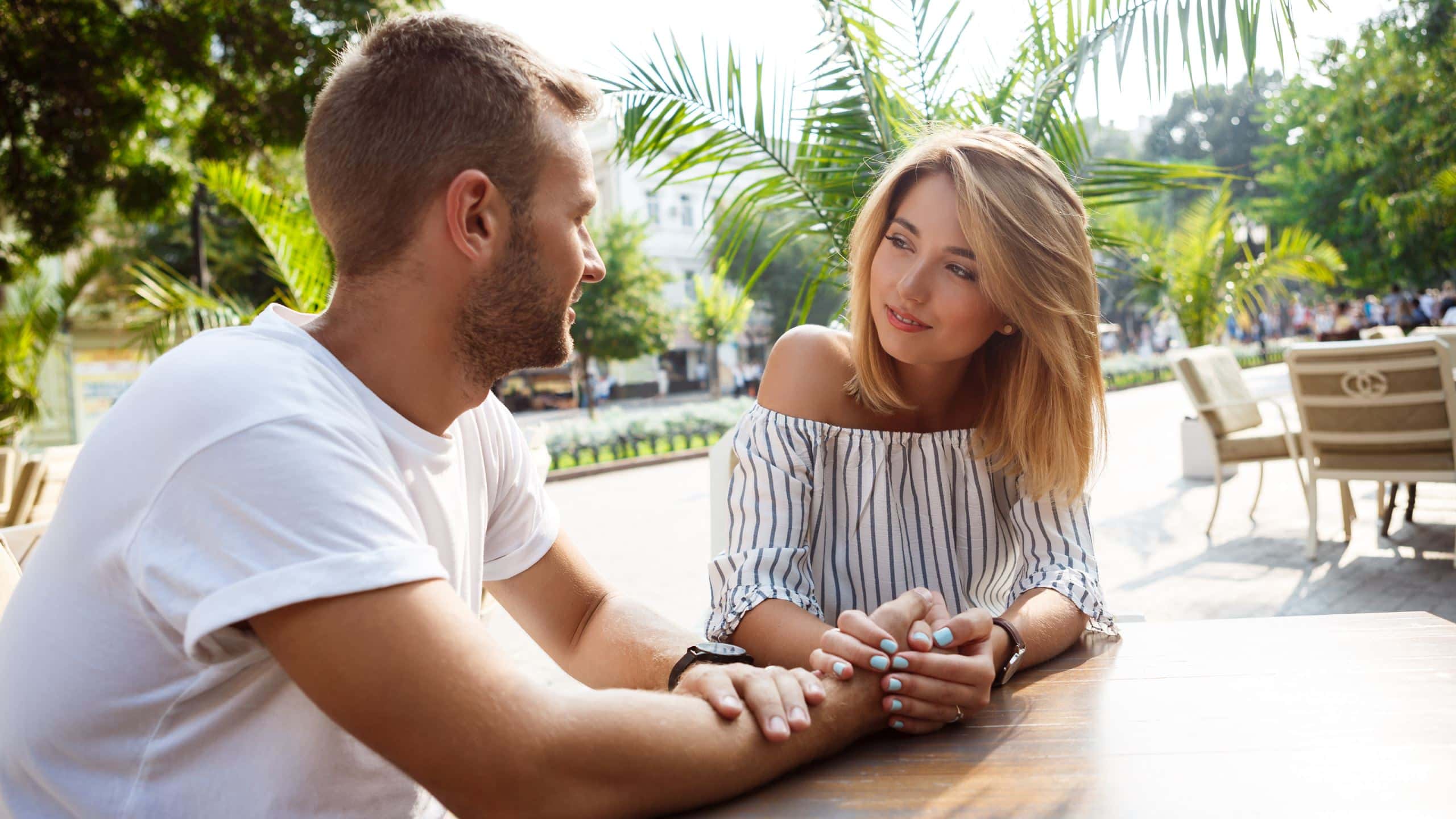 A man and woman having a conversation.